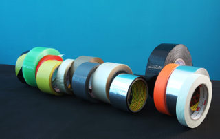 One sided adhesive tapes